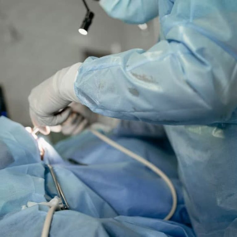Hernia repair surgery with mesh placement in operating theatre